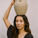 OKRA Jewelry, Roots